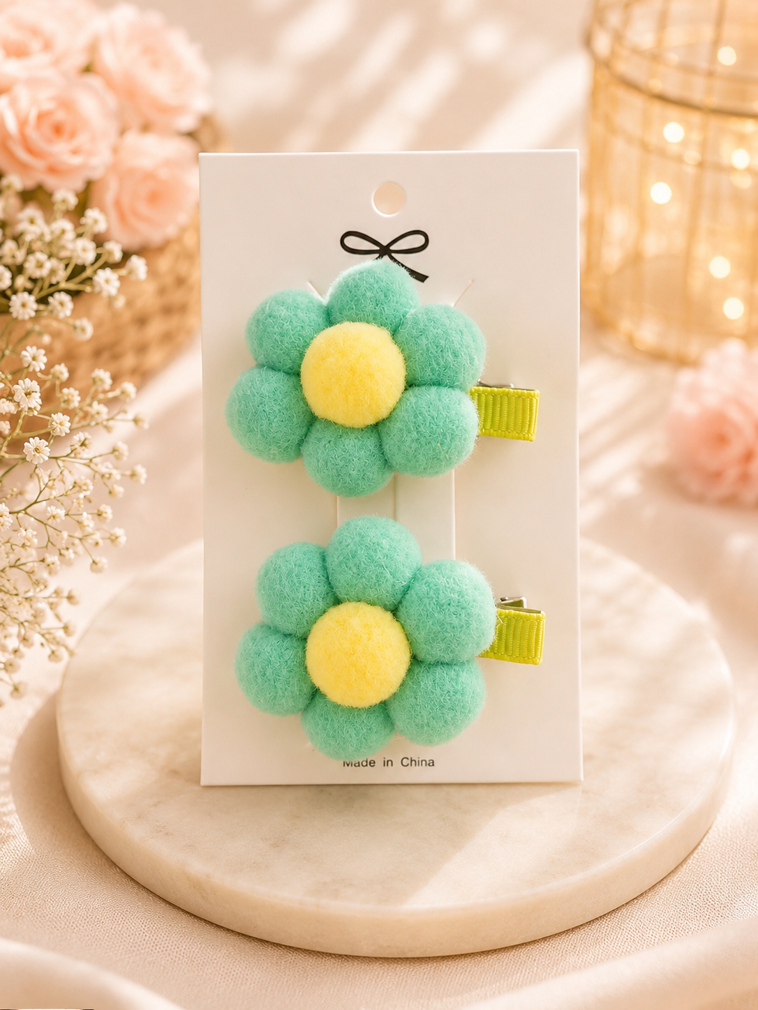 Barrettes à fleurs à pompons vert menthe et jaune – Lot de 2
